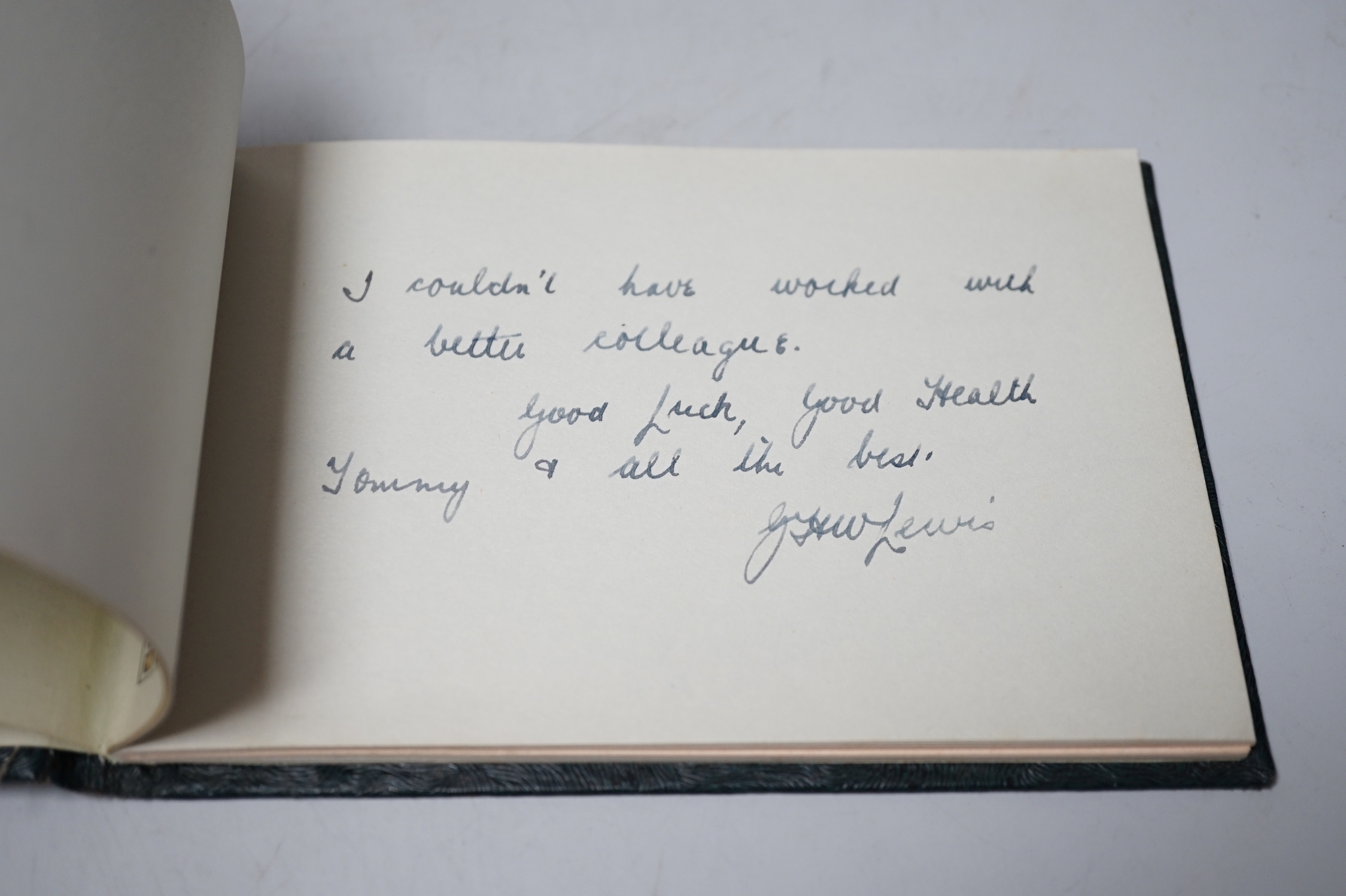 An Autograph book presented to EB Thomas esquire MBE, 4 January 1960 on the occasion of his retirement from public service with the Ministry of housing and local government, signed by his colleagues
